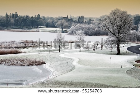 photo winter cold scenic landscape lake with castle in distance, ireland