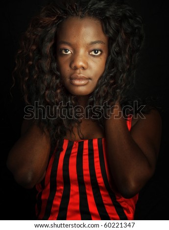 photo beautiful black female portrait on black