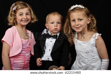 photo young family formal portrait on black