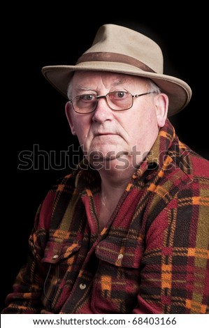 photo senior male retired wearing glasses and hat