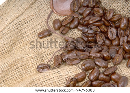 burlap bag tagged sealing wax with coffee bean