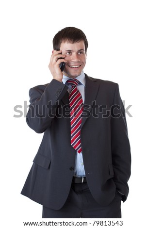 Satisfied young entrepreneur makes business call with cell phone.Isolated on white background.