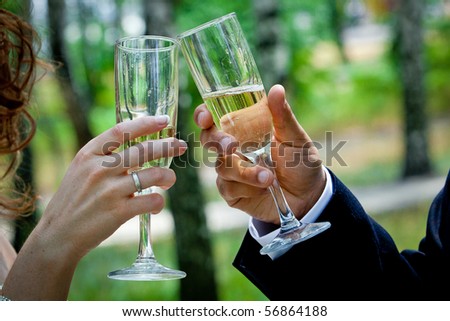 stock photo wedding theme the hand with a glass of champagne