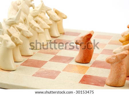 A brave lone stone pawn making the first move in a chess match