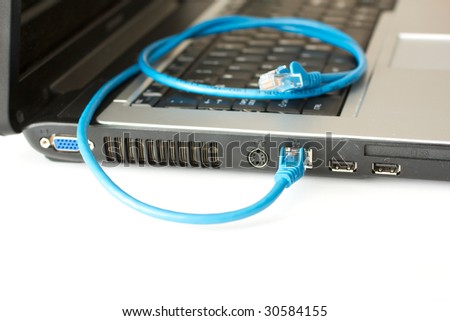 Cable Ethernet on Laptop With A Blue Ethernet Cable Plugged In Stock Photo 30584155
