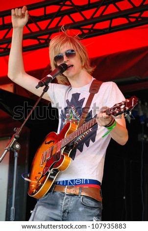 TENTERDEN, ENGLAND - JUNE 30: Max Davenport, lead singer of British indie band Out Side Room (now Propellers) performs at the annual Tentertainment music festival on June 30, 2012 at Tenterden, Kent.