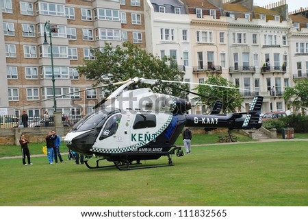 ST.LEONARDS-ON-SEA, ENGLAND - SEPTEMBER 3: The Kent Air Ambulance landed in Warrior Square Gardens while attending a medical emergency on September 3, 2012 at St.Leonards-on-Sea, East Sussex.