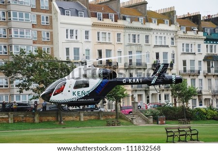 ST.LEONARDS-ON-SEA, ENGLAND - SEPTEMBER 3: The Kent Air Ambulance takes off from Warrior Square Gardens after attending a medical emergency on September 3, 2012 at St.Leonards-on-Sea, East Sussex.
