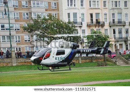 ST.LEONARDS-ON-SEA, ENGLAND - SEPTEMBER 3: The Kent Air Ambulance takes off from Warrior Square Gardens after attending a medical emergency on September 3, 2012 at St.Leonards-on-Sea, East Sussex.