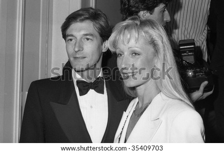 LONDON-OCTOBER 18: Nigel Havers, British actor, attends a celebrity event with his wife on October 18, 1990 in London.