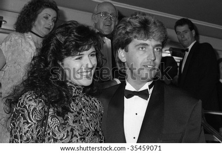 LONDON-OCTOBER 18: Rosemarie Ford, British game show hostess, and Graham Bickley, British actor, attend a celebrity event on October 18, 1990 in London.
