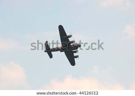 EASTBOURNE, ENGLAND-AUGUST 16: A World War Two, Avro Lancaster bomber aircraft gives a display on August 16, 2009 in Eastbourne, Sussex.