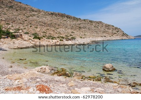 The secluded pebble beach at Kania on the Greek island of Halki.