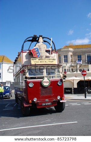 HASTINGS, ENGLAND - JULY 30: Happy Harold, a Guy BTX Trolley Bus dating from 1928, gives rides along the seafront during the Old Town carnival on July 30, 2011 in Hastings, East Sussex.