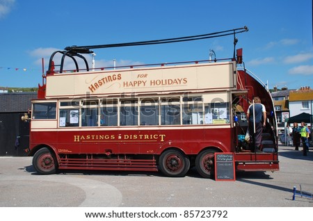HASTINGS, ENGLAND - JULY 30: Happy Harold, a Guy BTX Trolley Bus dating from 1928, gives rides along the seafront during the Old Town carnival on July 30, 2011 in Hastings, East Sussex.