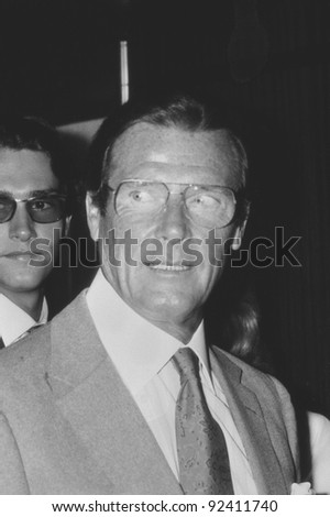 LONDON - MAY 27: Roger Moore, British actor, attends a celebrity event on May 27, 1989 in London. He is best known for his film roles as secret agent James Bond.