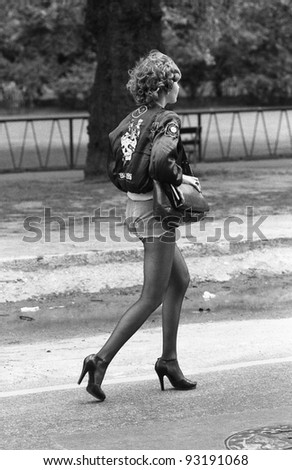 LONDON - MAY 15: An unidentified female music fan takes part in the Rock 'n' Roll Radio Campaign march on May 15, 1976 in London, England. The campaign aims to get more vintage  Rock 'n' Roll music played on British radio.