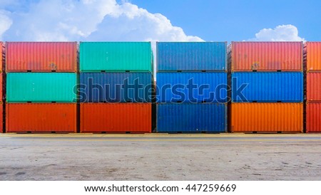 Business and logistics. Cargo transportation and storage. Equipment containers with blue sky.