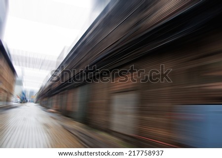 Motion blurred image of depots in industrial district