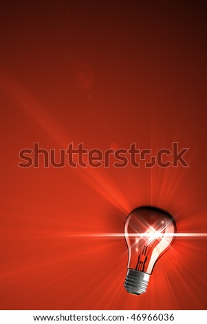 Radiating light bulb idea red background with copy-space