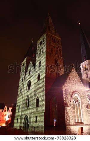 St. Jacobskerk in Ghent, Belgium, during the festival of lights. Portuguese mosaic on the building projected