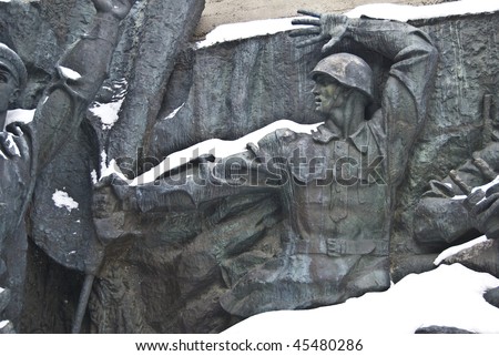 bas-relief sculpture honoring World War II soldiers