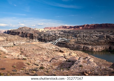 Iron  bridge hanging over the Colorado river in Utah mountain desert