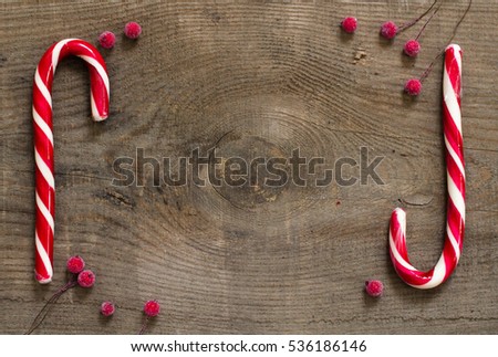 christmas candy, sweets, wood background, red berry, flatlay