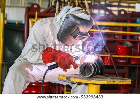 welding man working in factory