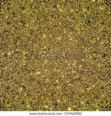 Abstract gold background with copy space. Gold glitter background. Gold glittering texture.