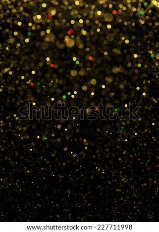 Gold sparkle glitter background. Glitter stars background. Sparkling flow background