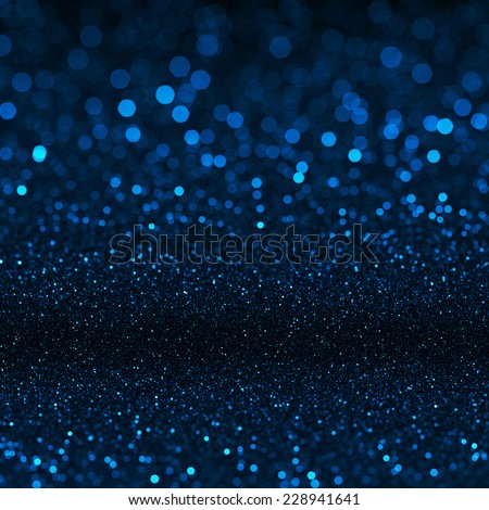 Blue bokeh texture. Festive glitter background with defocused lights