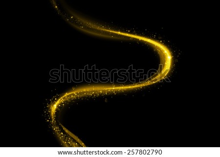 Glittering gold smoke tail. Twinkling glitter.