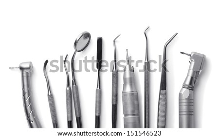 Row of various dental tools isolated on white Row of various dental tools isolated on white