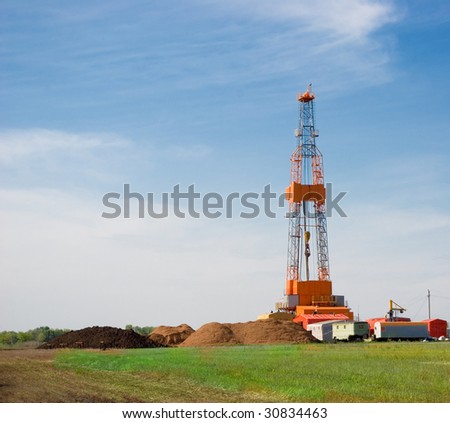 Oil drilling rig on the field
