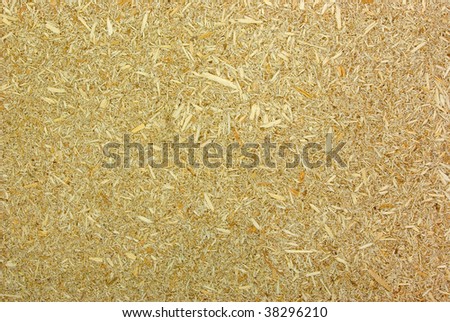 Particleboard - Wood shredded into tiny chips combined with adhesives  used as a substrate in construction and furniture industries