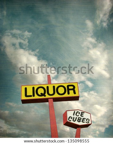 aged and worn vintage photo of liquor store sign