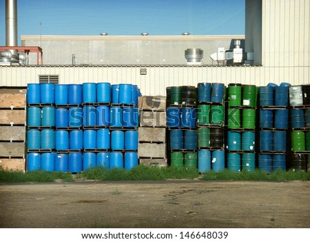 old waste containers stacked
