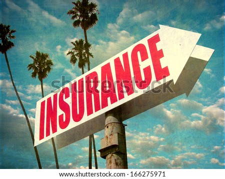 aged and worn vintage photo of insurance sign with arrow