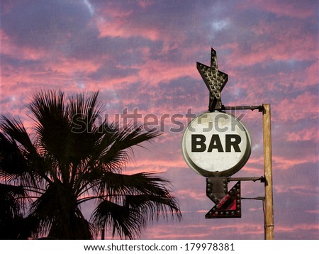 aged and worn vintage photo of bar sign with palm tree