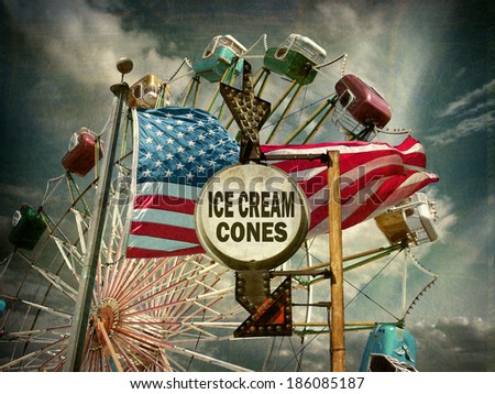 aged and worn vintage photo of carnival with ferris wheel american flag and ice cream sign