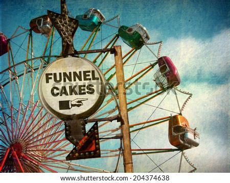aged and worn vintage photo of funnel cakes sign at carnival