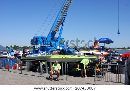 KENNEWICK, WA - JULY 25 : Hydroplane racing boats sitting in pit area during Tri-Cities Water Follies annual event