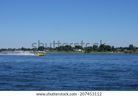 KENNEWICK, WA - JULY 25 : Hydroplane racing boat moves along Columbia river during Tri-Cities Water Follies event