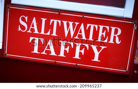 saltwater taffy sign at carnival