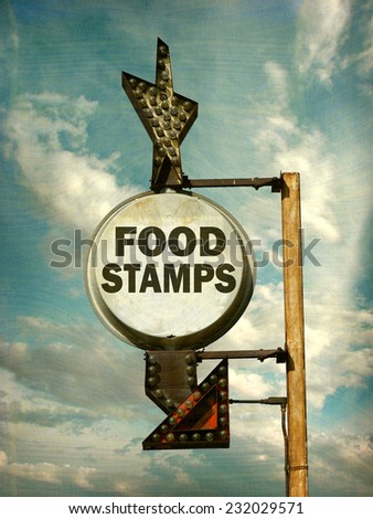 aged and worn vintage photo of  food stamps sign