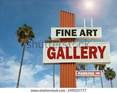 aged and worn vintage photo of fine art gallery sign with bright sun