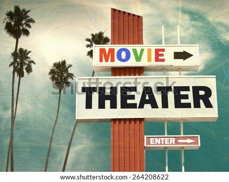 aged and worn vintage photo of movie theater sign with palm trees