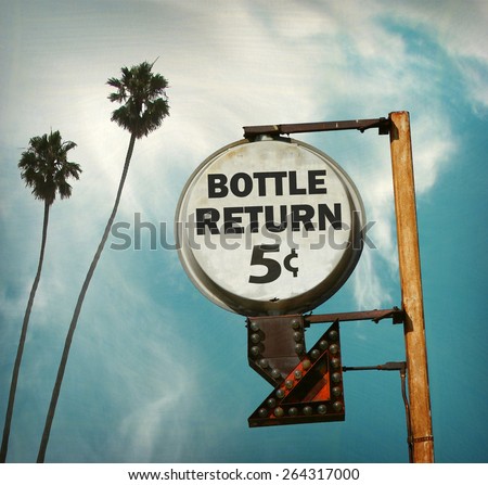 aged and worn vintage photo of bottle return recycle sign