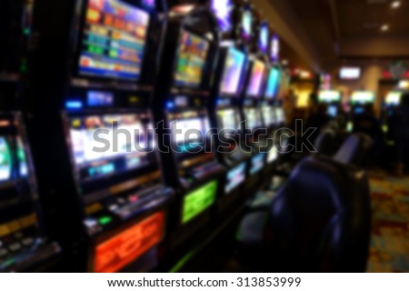 blurred background of casino slot machines